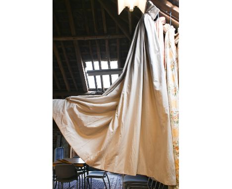 A pair of plain beige linen lined and interlined curtains with triple pleat header, c/w matching folding bay window pelmet, a