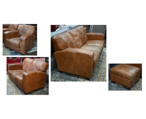 A modern antiqued tan leather three seater sofa to/with a matching two seat sofa, an armchair and ottoman storage cube (4)