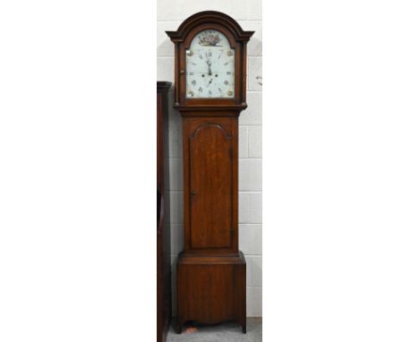 An early 19th century oak longcase clock, the floral painted dial with subsidiary seconds and date dials on an eight day move