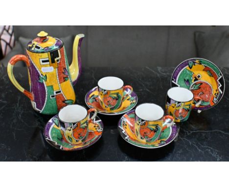 A Royal Winton Jazz coffee pot to/w four matching coffee cans and saucers, printed with Vorticist-style polychrome pattern