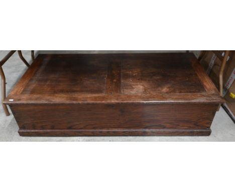 A low oak blanket chest/trunk, dovetailed panelled construction with hinged top, 122 cm x 60 cm x 30 cm h