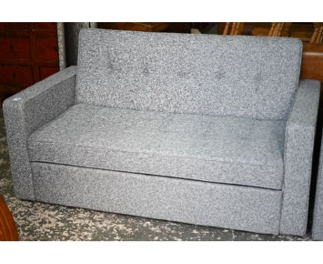 A modern sofa bed by 'Dreams', grey flecked fabric covers,&nbsp;little evidence of use