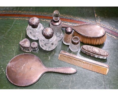 Eight silver-mounted toilet jars to/w a silver-backed mirror, brush and comb (box)
