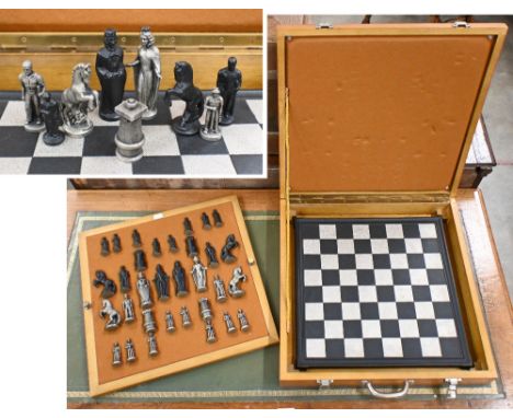 A Buderus cast metal chess set with board, in fitted wooden case