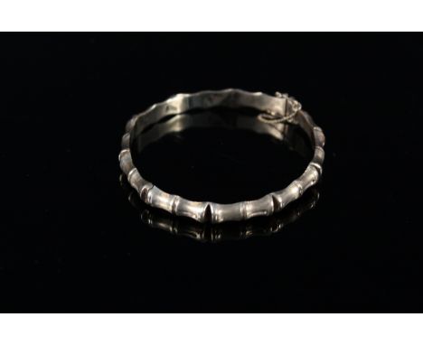 A 9ct gold bamboo style bangle, weight approx 11.5g