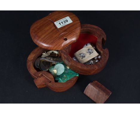 A quantity of costume and silver jewellery including silver enamelled brooch in an unusual apple form tiered wooden box