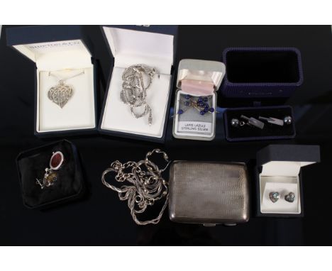 A collection of silver jewellery including necklaces, earrings etc, a pair of cricket themed cufflinks and a small silver cig