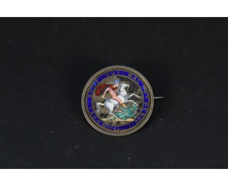 An enamelled silver George III coin in unusual white metal swivel mount with brooch fitting