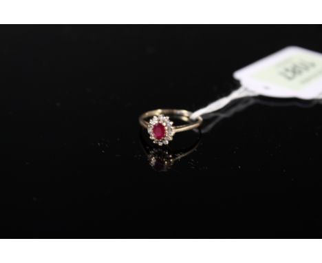 A 9ct gold ruby and diamond set ring, size N 1/2, weight approx 2g