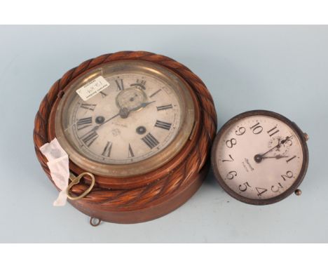 An early 20th Century American wall clock by Ansonia and an Ingersoll Puritan alarm clock