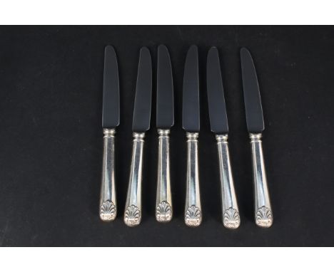 A set of six silver handled shell pattern side knives, hallmarked Sheffield 1988