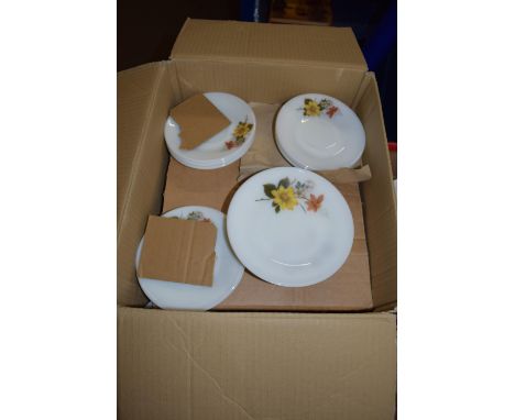 BOX CONTAINING WHITE PYREX TYPE FLORAL DECORATED CUPS AND SAUCERS