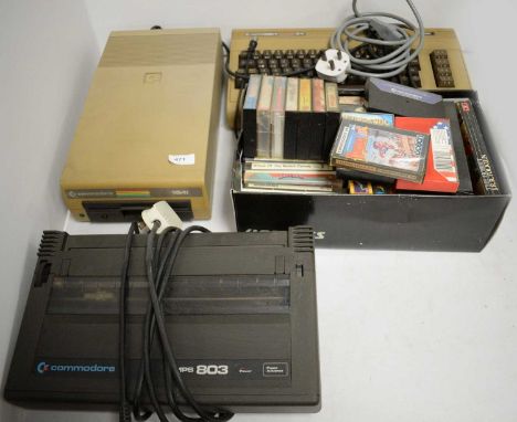 A selection of three Vintage Commodore computers, comprising: Model No. MPS803; Model No. 154I; and Model No. 64; together wi