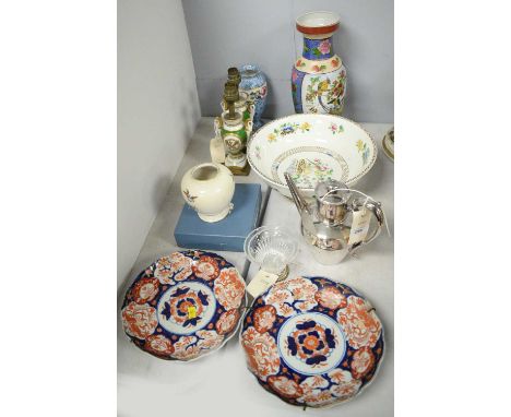 A selection of decorative ceramics, including: a pair of miniature ceramic and brass-mounted table lamps, of twin-handled urn