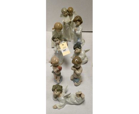 A selection of Lladro and Nao figures, comprising: three Lladro figures of putti; two Lladro figures of children; and three N