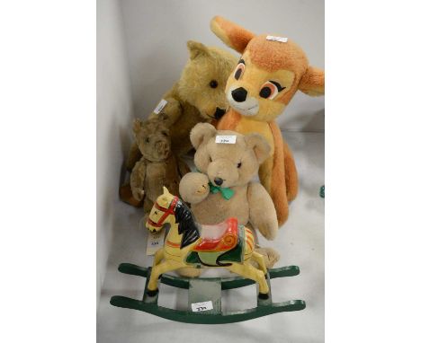 A selection of toys and teddy bears, including: a 20th Century miniature rocking horse, painted in shades of green, cream and