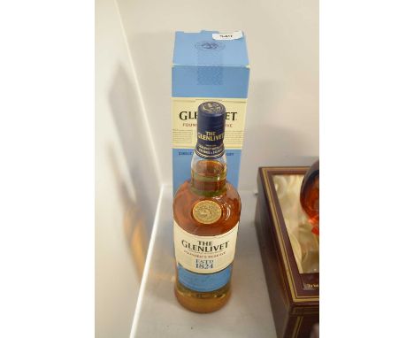 A bottle of Glenlivet Single Malt Scotch Whisky, Founder's Reserve, in box.