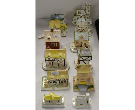 A collection of 20th Century Coalport ceramic pastille burners, various models, including: 'The Coaching Inn', 'Bridge House'