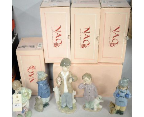 A selection of five Nao ceramic figures, each modelled as a figure of a boy, the tallest approximately 26cms high, each with 