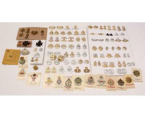 A collection of British collar badges, including; The Hampshire Regt; 15/19th Hussars; Army Catering Corps; Royal Military Po