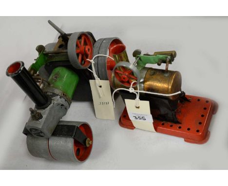 Mamod steam engine, painted with red, green and black accents; together with a smaller steam engine. (2) 