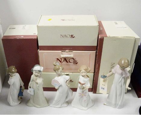 A selection of five Nao figures of girls, of various designs, the tallest 25.5cms high, each with original box.