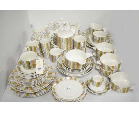 A Minton 'Haddon Hall' pattern tea service, comprising six tea trios, tea pot, cream, sugar and sandwich plate; together with