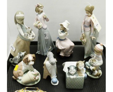 A selection of Lladro and Nao figures, including: two figures of girls holding baskets of flowers; two figures of girls holdi