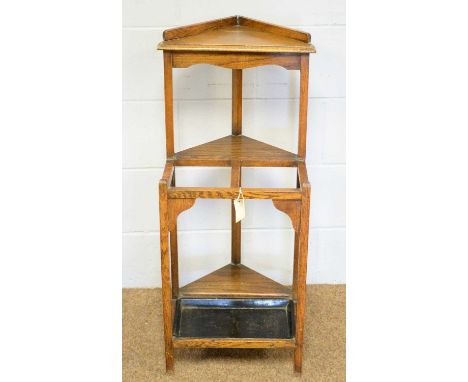 An Edwardian oak corner stick stand, 42 x 47 x 93cms high.