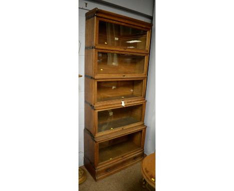 The Globe-Wernicke Co. Ltd., London: an early 20th Century oak five-tier bookcase, also with retailer's labels of Sopwith &am
