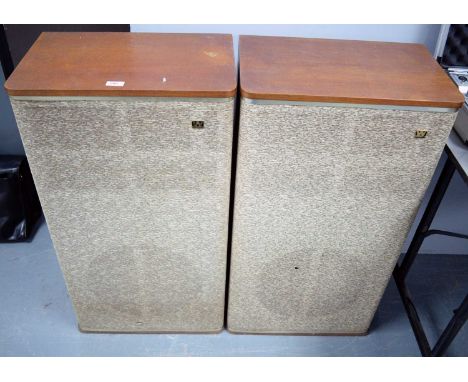 A pair of Teesdale floor standing vintage speaker cabinets, by Wharfedale, in mahogany, with cloth-covered grills, 89cms high