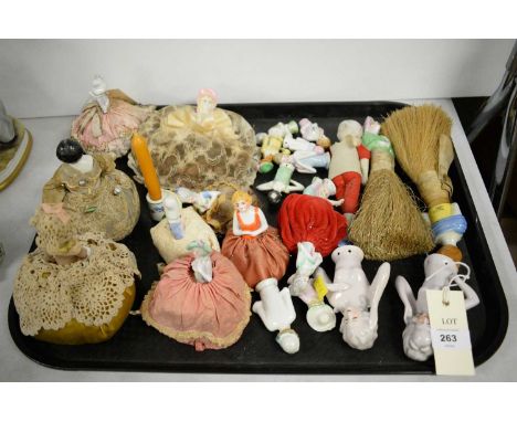 A selection of 20th Century ceramic pin cushion/teapot topper, each formed as a figure, various sizes and designs.