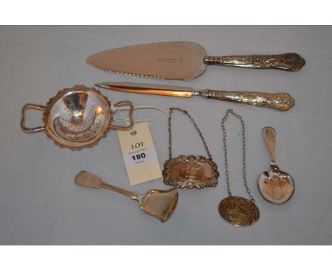 A selection of silver items, including: a caddy spoon by Thomas Walton, Newcastle; another (unmarked); a tea strainer; two de