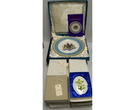 A set of twelve Coalport ceramic month plaques, each decorated with a flower in high relief, each in box; together with a Spo