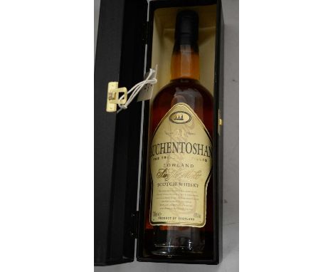 A bottle of Auchentoshan Triple Distilled Single Malt Scotch Whisky, 21 Years Old, contained in presentation case.