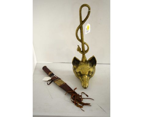 A contemporary brass door stop, in the form of a fox head, 38.5cms high; together with a replica ceremonial dagger with sheat