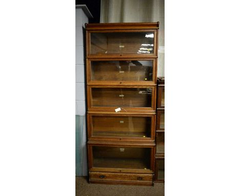 The Globe-Wernicke Co. Ltd., London: an early 20th Century oak five-tier bookcase, also with retailer's labels of Sopwith &am