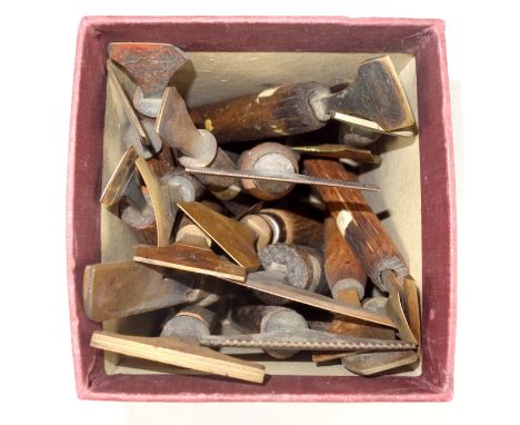 20 gold finishing bookbinding hand tools comprising pallets and gouges, and 3 without handles. (23)