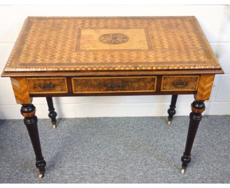 Victorian colonial dressing table with a specimen wood chevron inlaid top centred by an oval, centre drawer with a hinged sli