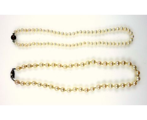 Cultured pearl uniform bead, (8mm), necklace, with pearl set silver clasp, L.45cm, and a smaller bead necklace with a magneti