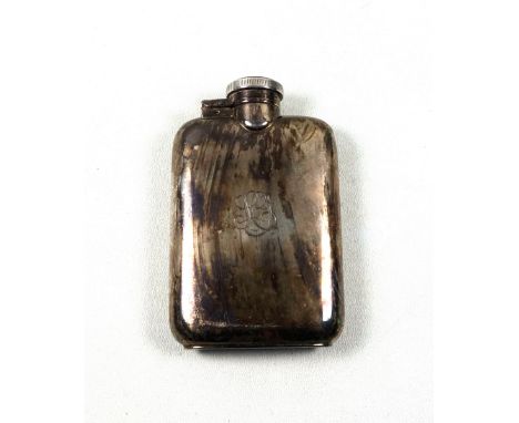 Indian silver hip flask of curved rounded rectangular form, with a hinged twist-locking bayonet cover, engraved with monogram