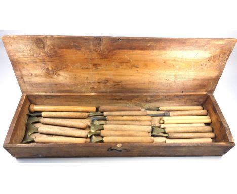 19 gold finishing bookbinding hand tools comprising pallets and gouges, and 5 spare handles. (24)