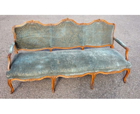 19th Century Louis XV style beech salon sofa with carved floral decoration, triple arched back, padded open arms and serpenti