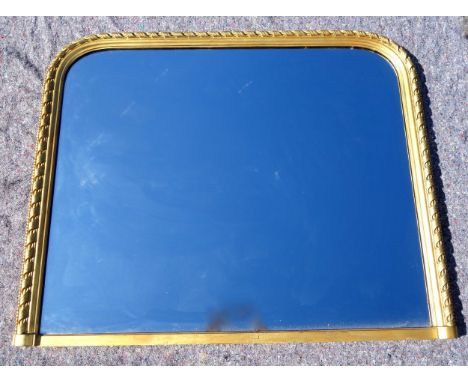 Victorian overmantel mirror with a rectangular plate with rounded top corners, in a gilt moulded rope-twist and bead decorate