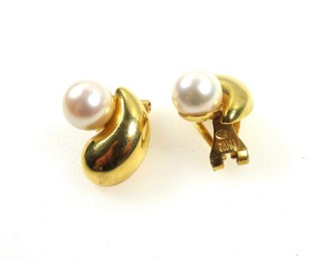 Pair of foreign yellow metal and pearl ear clips, stamped "750", 4.3grs, in a silk purse. (3) 