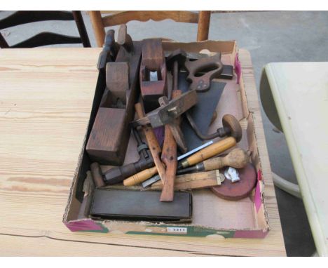 A tray of bygone carpenters tools 
