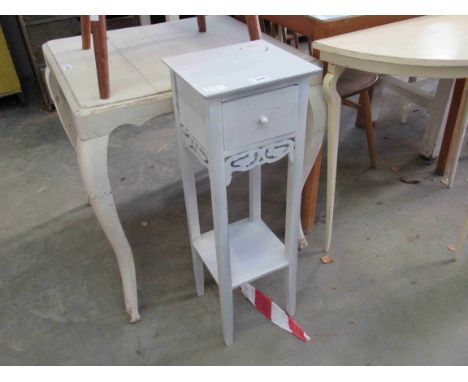 A blue painted lamp stand with single drawer and under-tier 