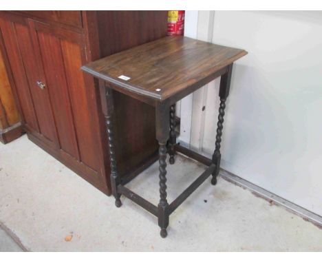 A 1930's oak barley twist lamp table 