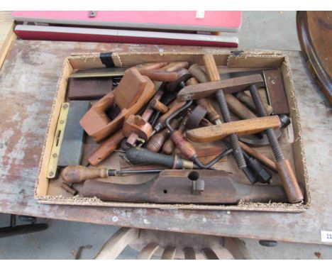 A tray of bygone carpenters tools 