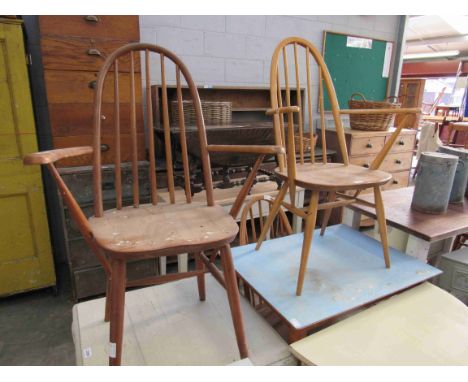 Two light Ercol elm stick back Windsor chairs, one a carver chair and a similar elbow chair with a small 1950's kitchen table